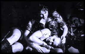 Xena tries to comfort an injured Gabrielle